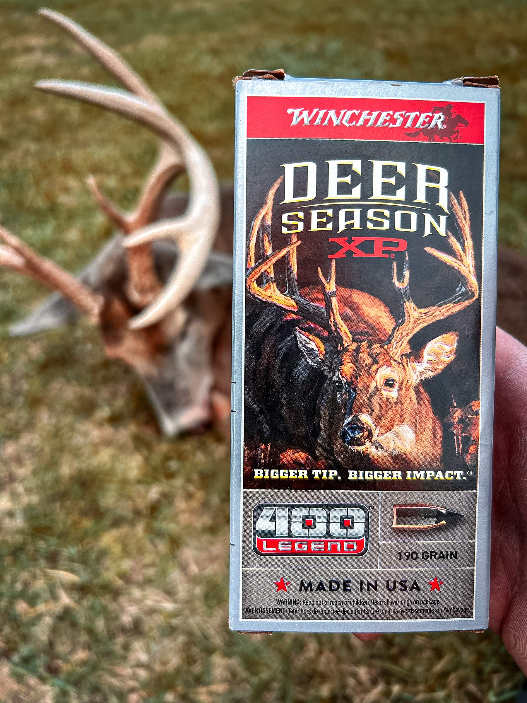 Winchester Deer Season XP 400 Legend ammo box with buck in the background