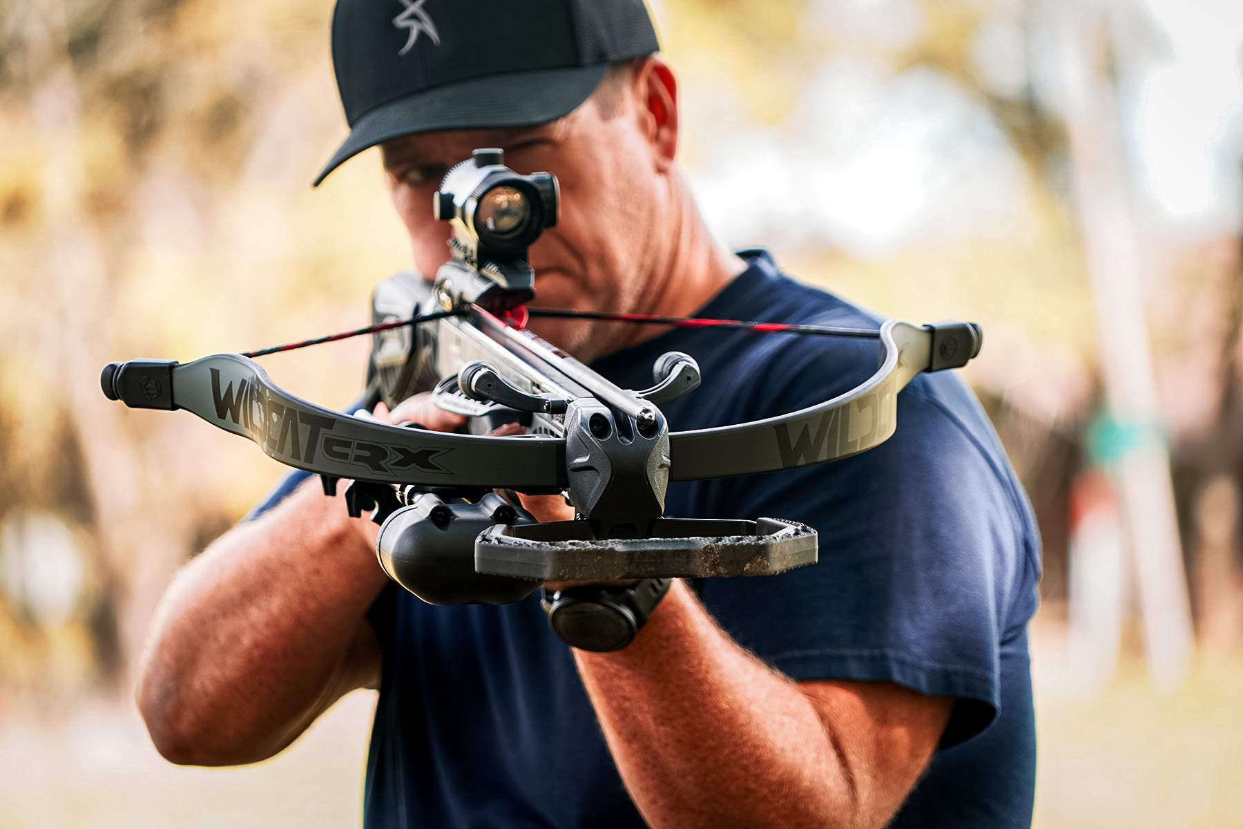a man aiming the Barnett Wildcat CRX crossbow