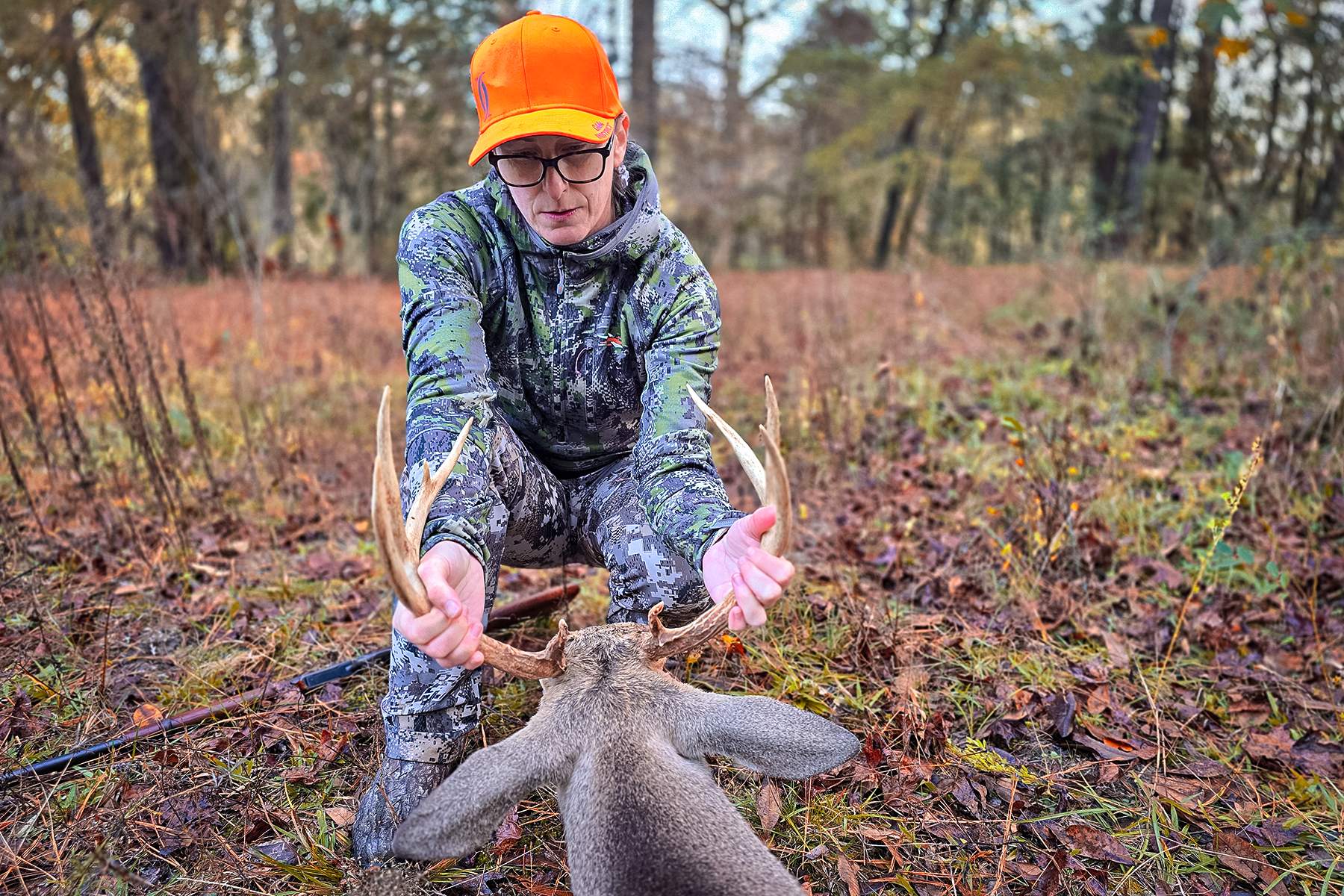 a hunter with a buck